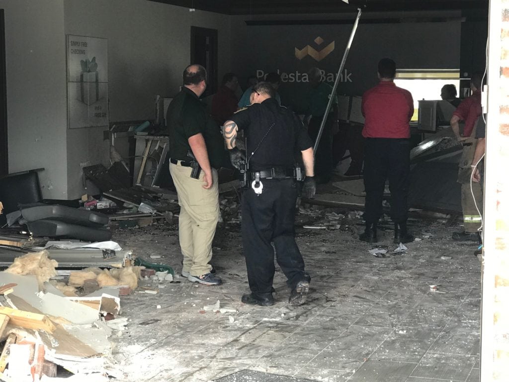 An SUV drove into the front of the Pedestal Bank in Breaux Bridge this morning.