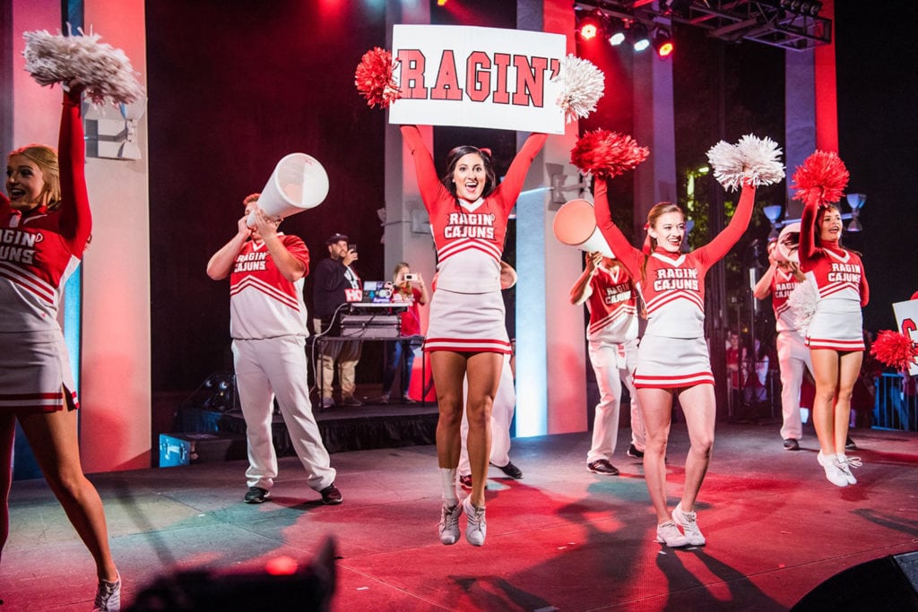 Photo caption: Louisiana Ragin’ Cajuns cheerleaders fire up the crowd during last year’s Yell Like Hell. The traditional Homecoming Week pep rally will be held at 7 p.m. Thursday outside the Student Union. (Photo credit: Klint Landry / UL Lafayette Social Media Team)