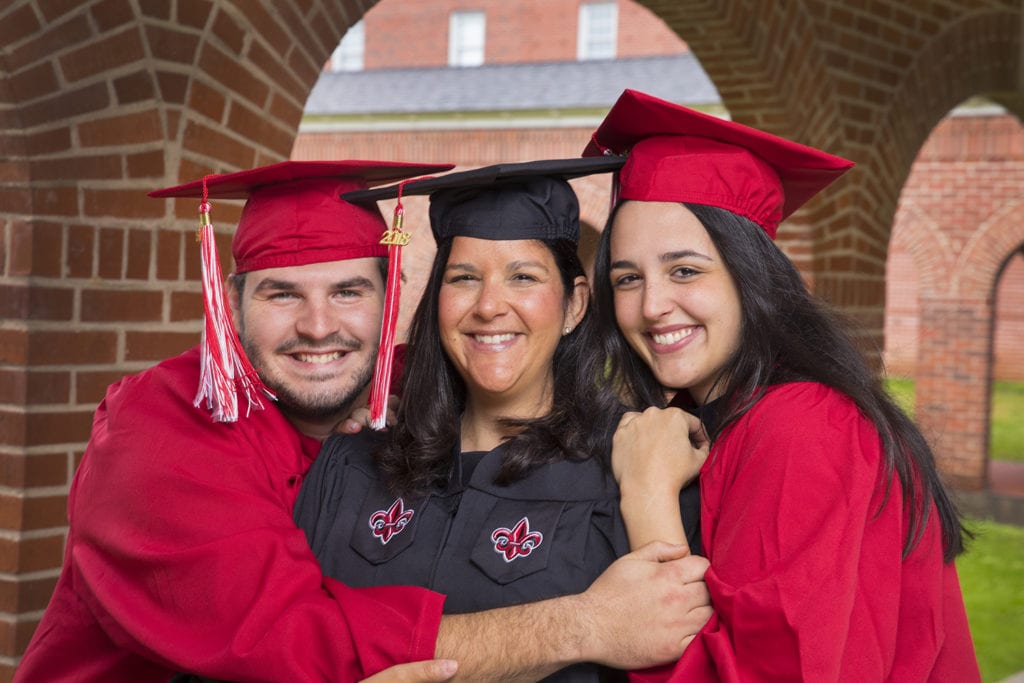 Photo: Vanessa Adamson (center), her daughter Avery (right) and her son Brock (left) were each awarded degrees during the University of Louisiana at Lafayette’s Fall 2018 Commencement ceremonies Friday. Credit: Doug Dugas/University of Louisiana at Lafayette.